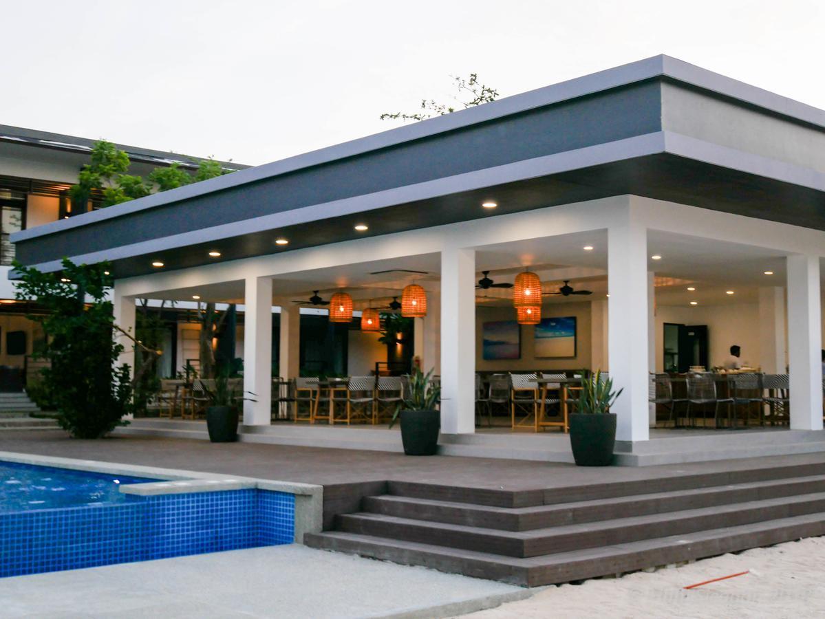 Huni Sicogon Hotel Carles Exterior photo